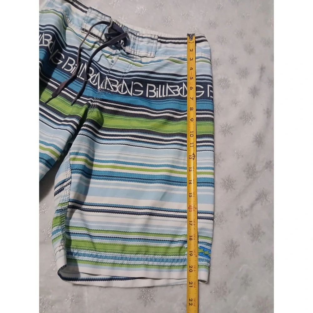 Billabong Board Shorts Size 30 with an attached fire starter and bottle opener